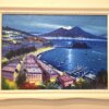 Il dipinto di Giuseppe Iannicella "Napoli" appeso a parete, che mostra l'intera baia illuminata dal chiaro di luna che si riflette sul mare.
