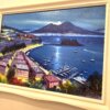 Vista angolare del quadro che evidenzia la prospettiva di Posillipo, la collina illuminata e la profondità del Golfo di notte.