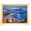 Vista frontale del quadro olio su tela 50x70 raffigurante Napoli di notte con il Vesuvio e la luna piena, inserito in una cornice bianca lavorata.