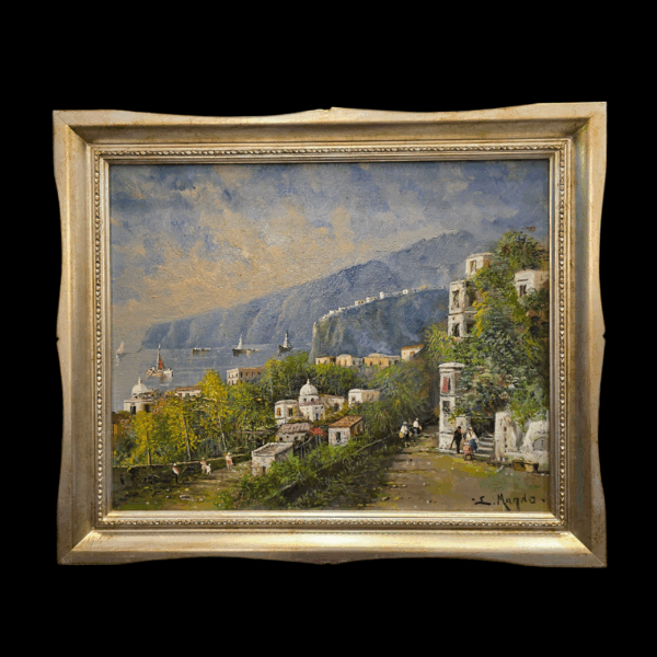 Quadro Eugenio Magno - Veduta Panoramica con Cornice Vista completa del quadro "Costiera Amalfitana" inserito in una cornice classica chiara, che mostra la profondità della scogliera e l'orizzonte marino.
