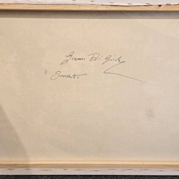 Retro della tela con la firma autografa del maestro Giovanni di Guida e il titolo dell'opera Sorrento scritto a mano a penna.