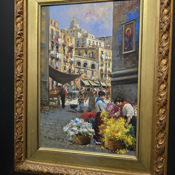 prospettiva-laterale-destra-quadro-vassetti-napoli Inquadratura angolata da destra dell'opera "Fioraie al Mercato" di Vassetti, evidenziando la lucentezza dei colori a olio e i dettagli della cupola sullo sfondo.
