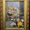 dettaglio-opera-olio-su-tela-fioraie-al-mercato-napoli Primo piano del dipinto a olio Fioraie al Mercato di Francesco Vassetti focalizzato sulla scena delle fioraie, il mercato di Napoli e la firma in basso a sinistra.